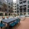 Outdoor lounge at our apartments for rent in Portland, OR, featuring outdoor couches, chairs, and a fountain.