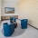 Resident lounge at our apartments for rent in Portland, Oregon, featuring three chairs around a table.